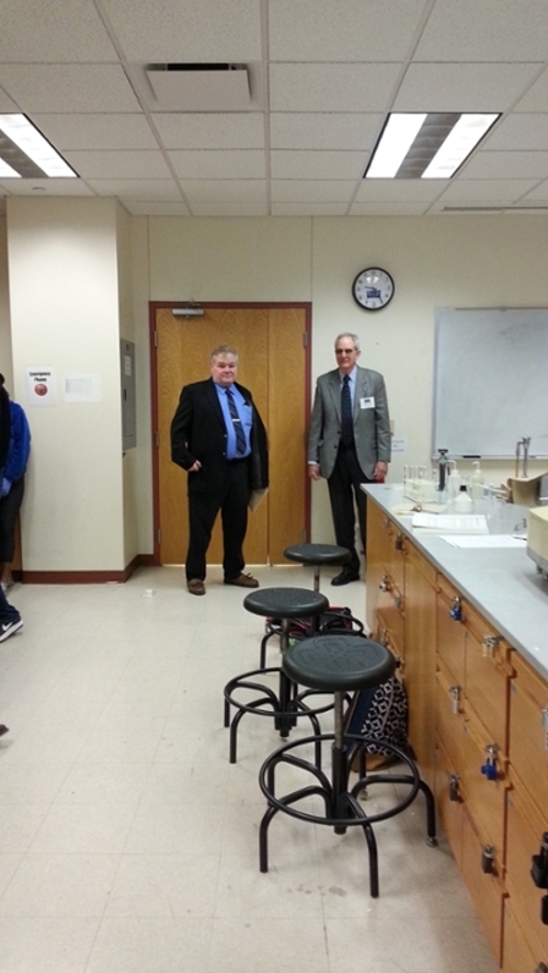 Dr. Billy Parkhill visiting a Chemistry Lab 