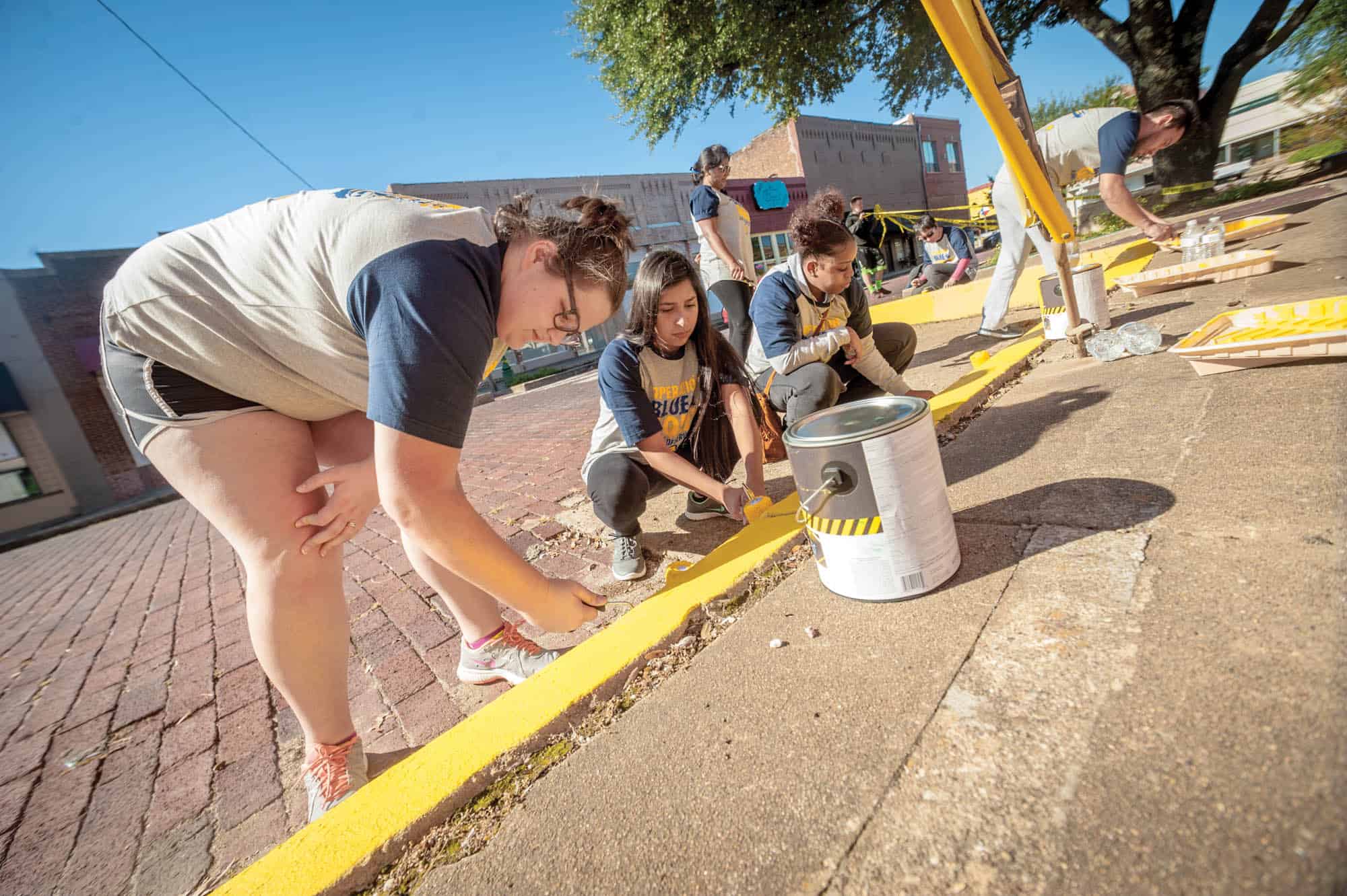 Students panting footpath 