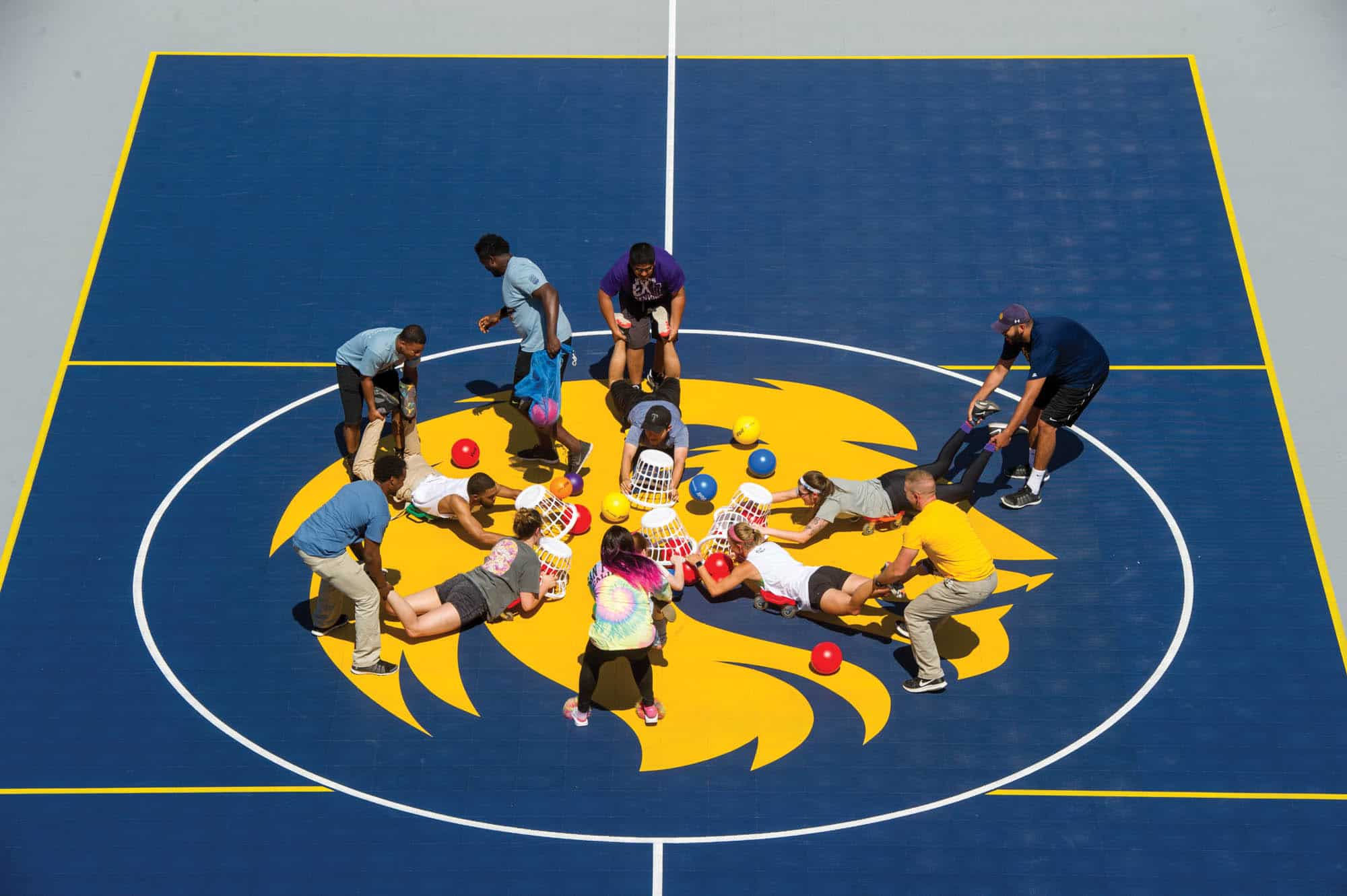 a group of students playing crocodile. 