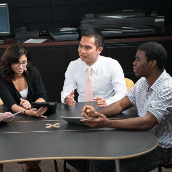 Three student discussing an idea