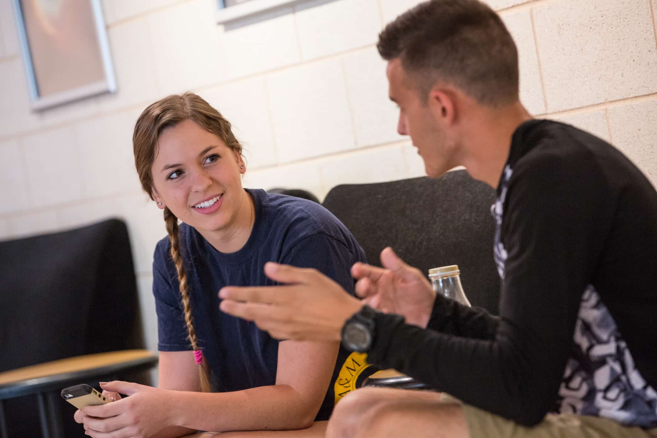 Students talking in science building