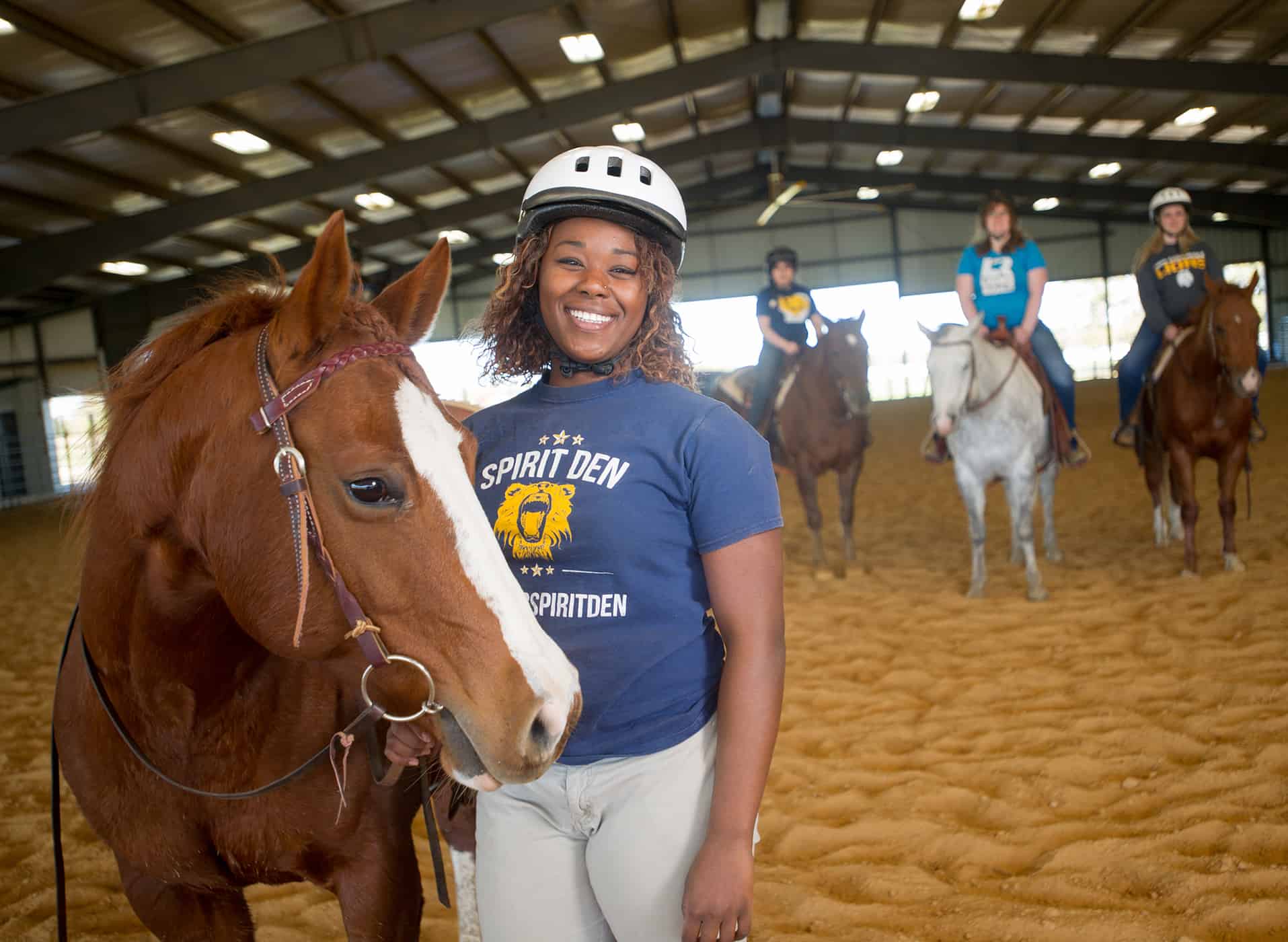 equine students with their horses.