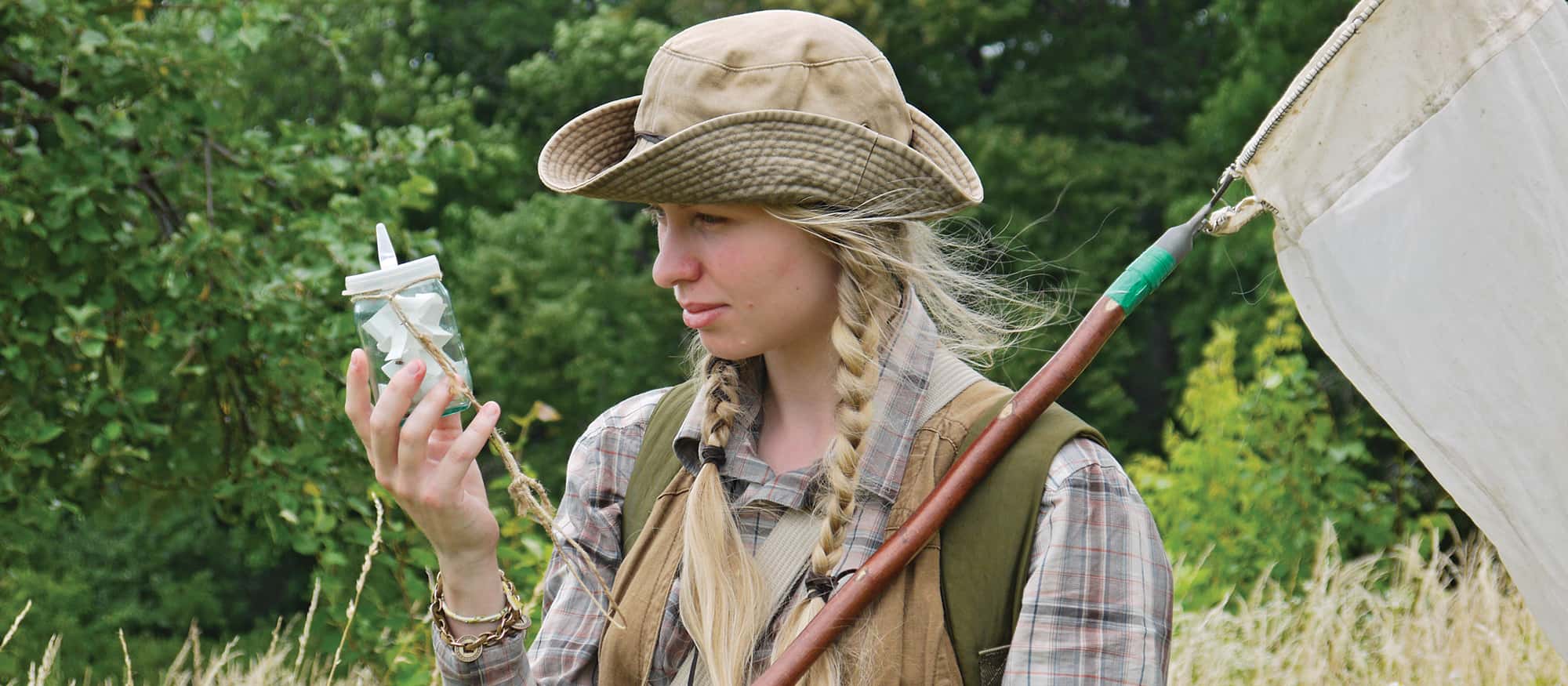 Wildlife Biologist student examining a specimen