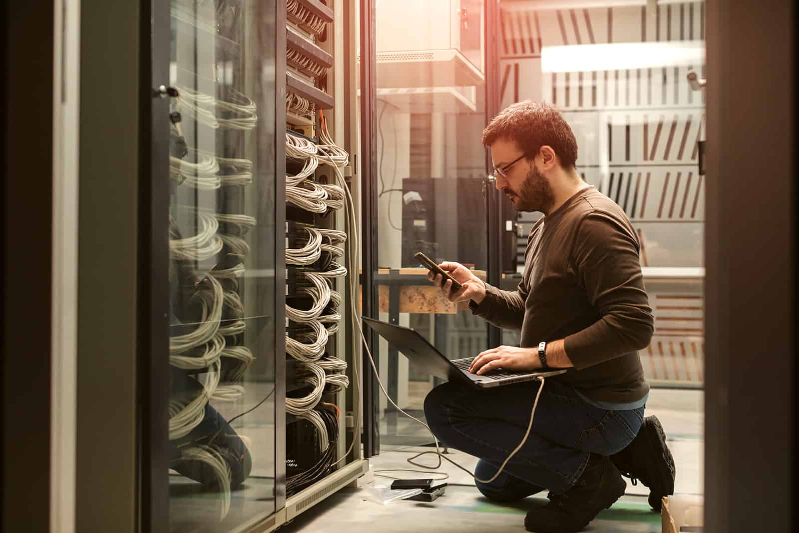 Person working on networking servers