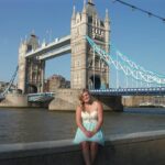 student behind tower bridge