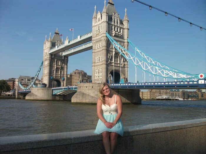 student behind tower bridge