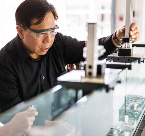 Professor working in biology lab