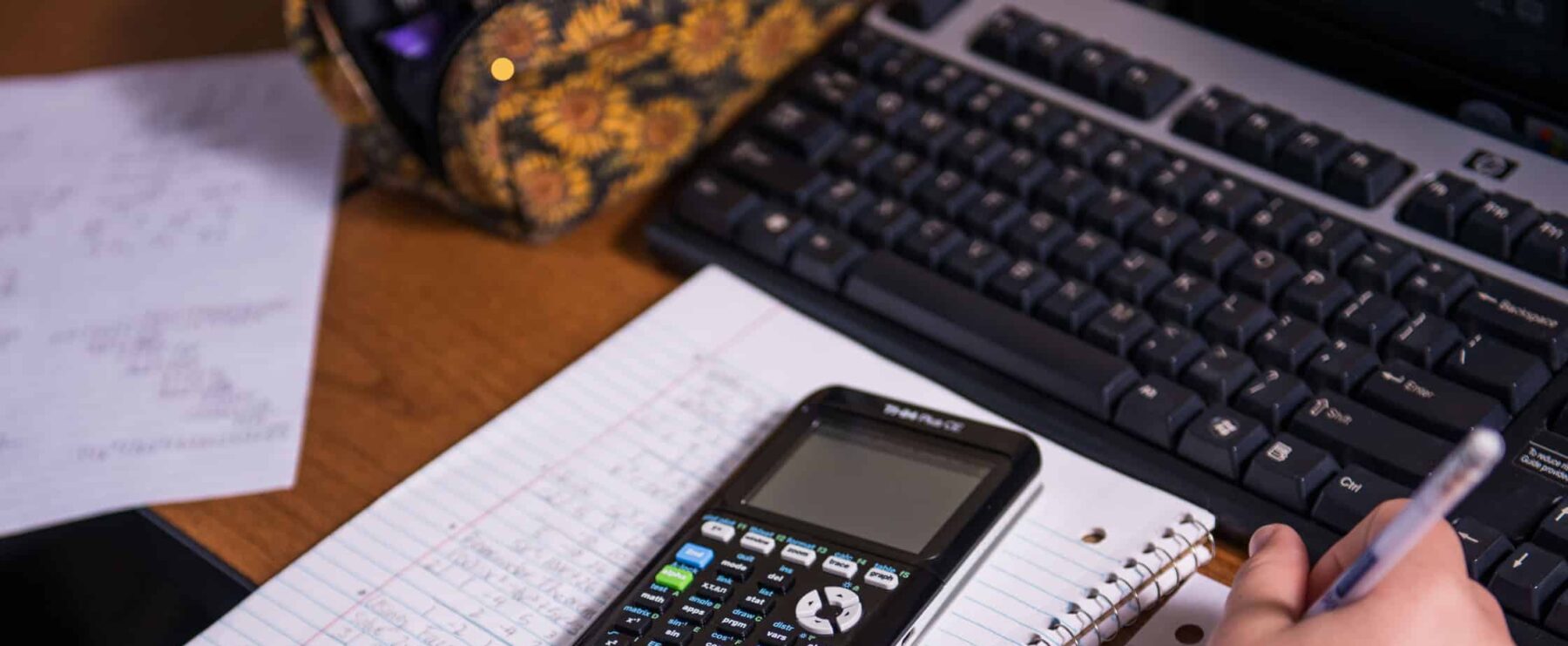 Close-up of student working on math homework