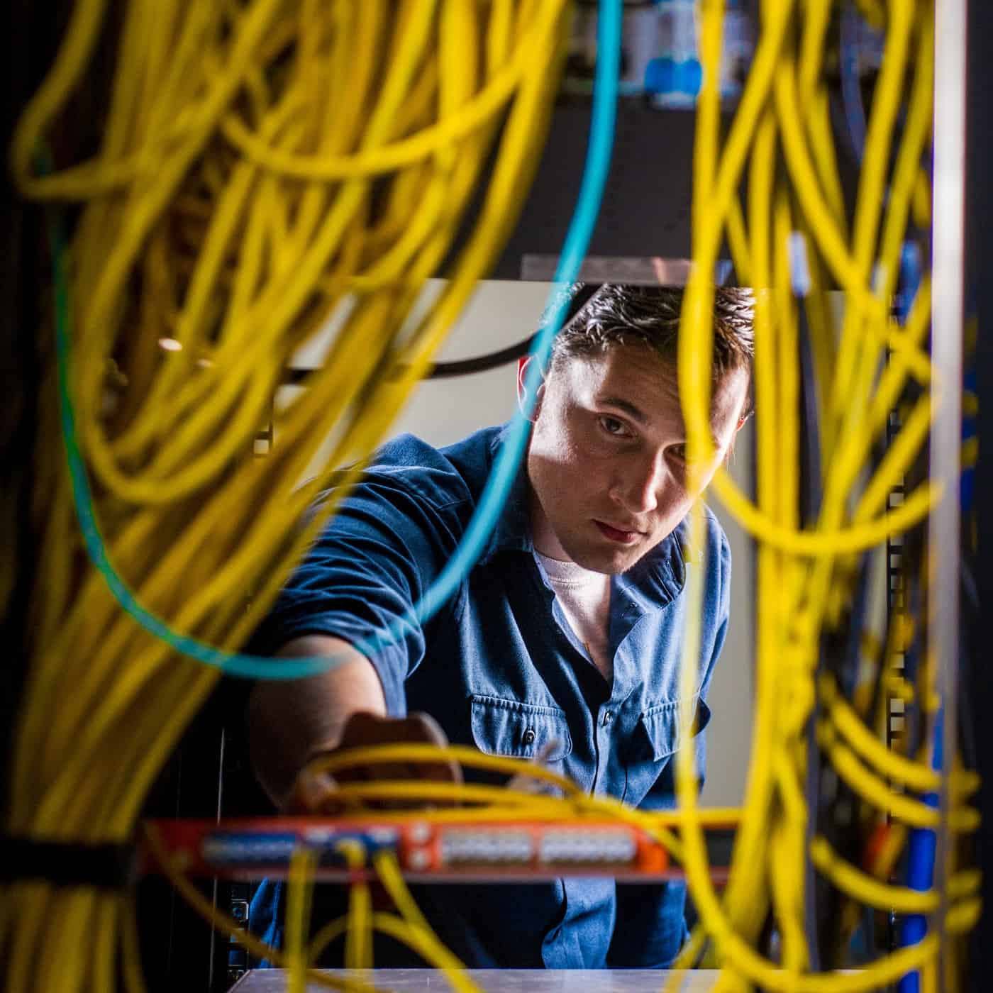 Engineer inspecting electrical gear