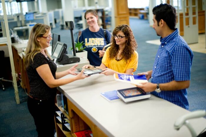 Library Checkout with three students .