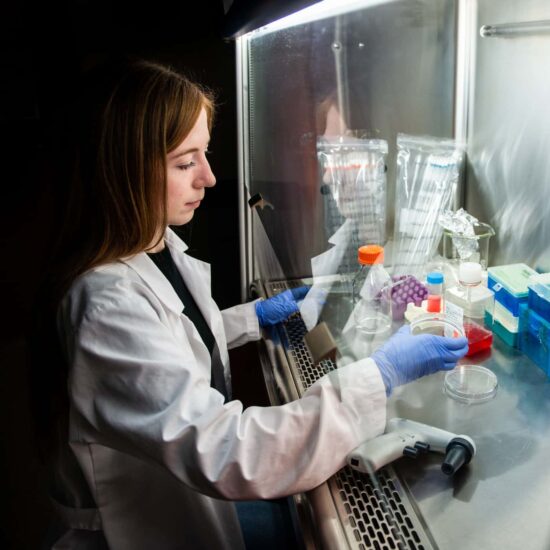 Student performing experiment in the lab.