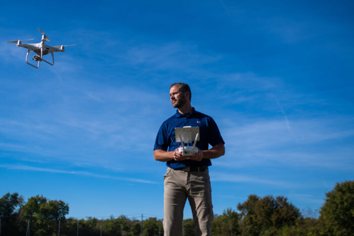 Joe Shipman flying a drone.