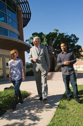 Randy VanDeven with students outside