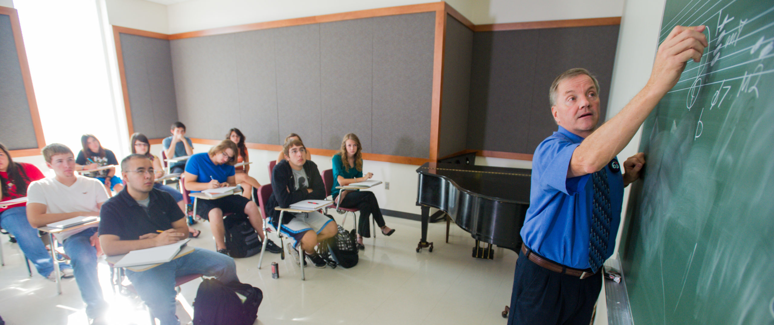 Music professor teaching a class.