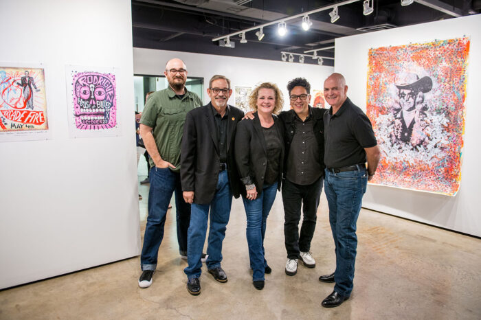 Faculty of the art department in a gallery. Starting from the left Joshua Ege, Virgil Scott, Lee Hackett, Carlos Hernandez and Casey McGarr.