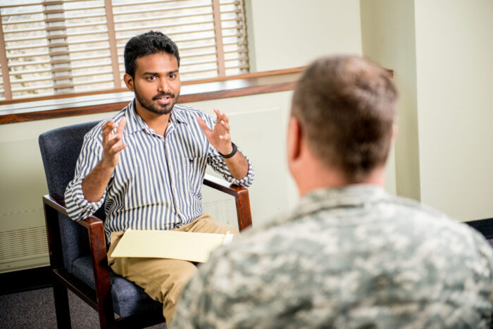 Social worker meeting with a patient.