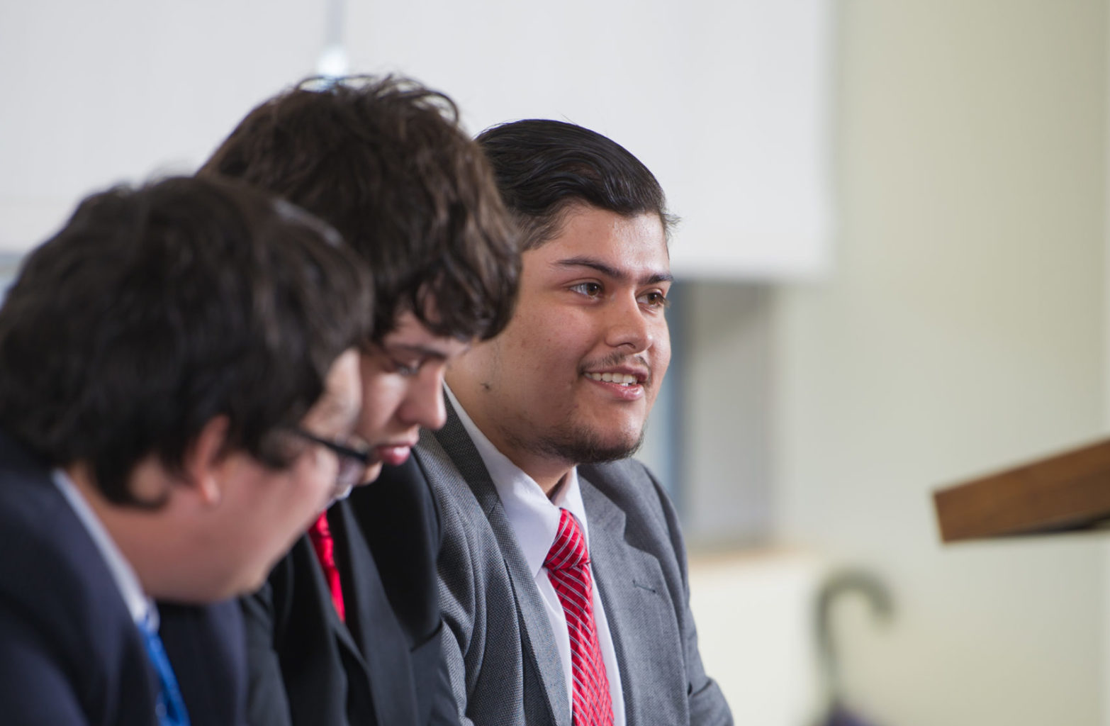 Group of political science students debating.