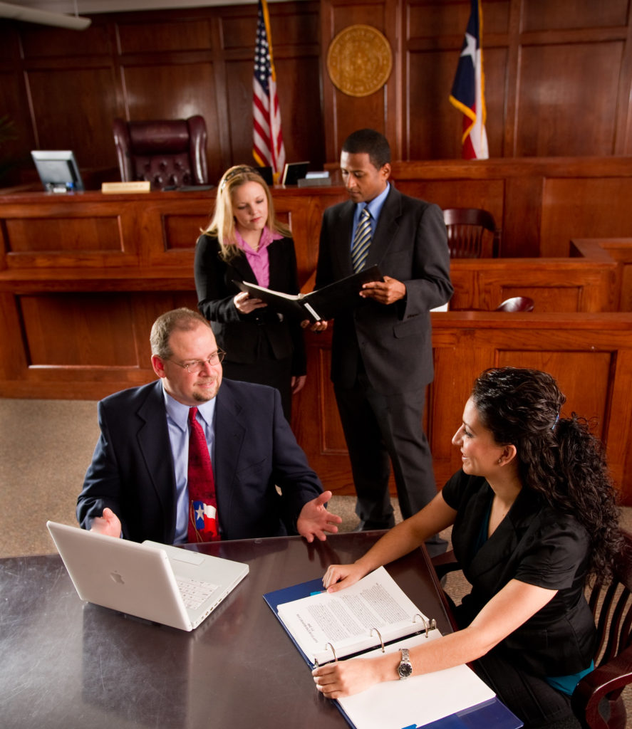 Social workers meeting in a court room.