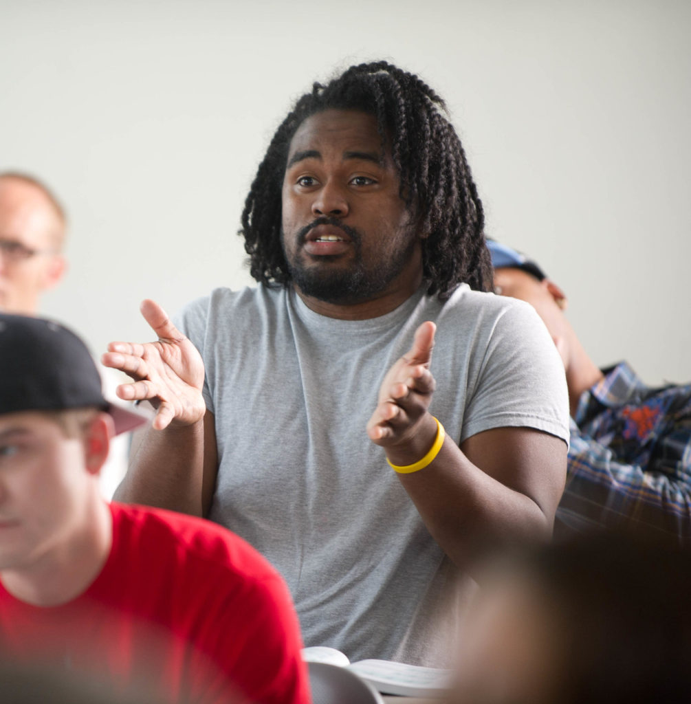 Student speaking in a sociology class.