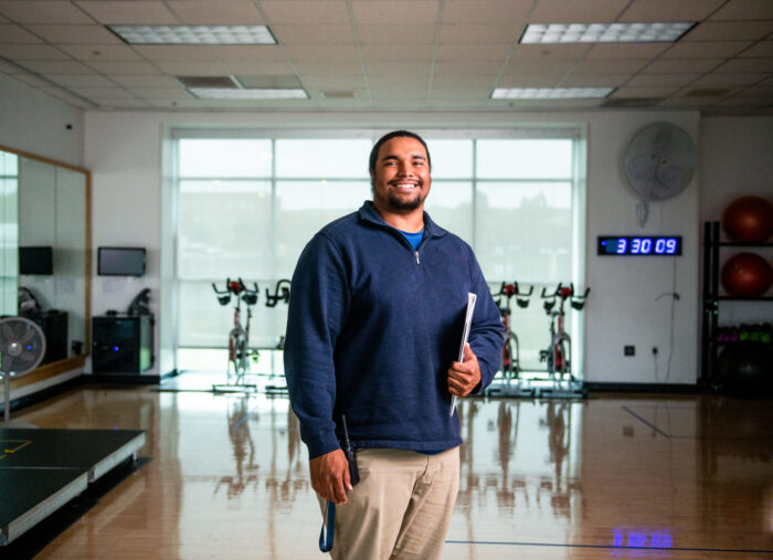 TAMUC Sport and Recreation Management student smiling at the camera.