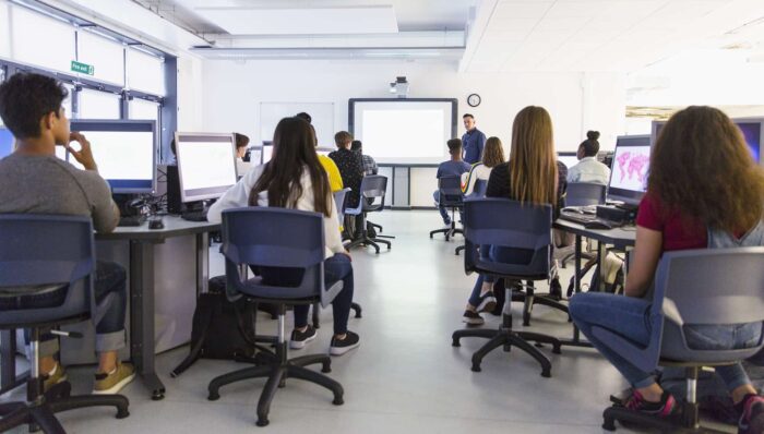 Instructor giving a presentation to the class.