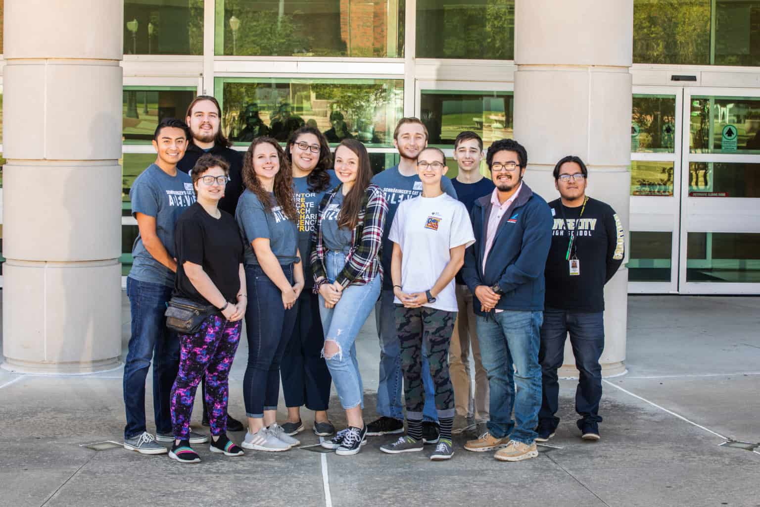 Group standing in front of a building.