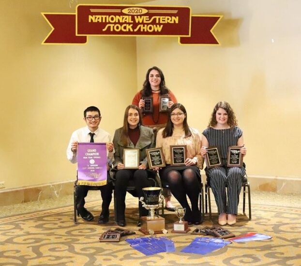 The Meat Judging team in a room with their awards.