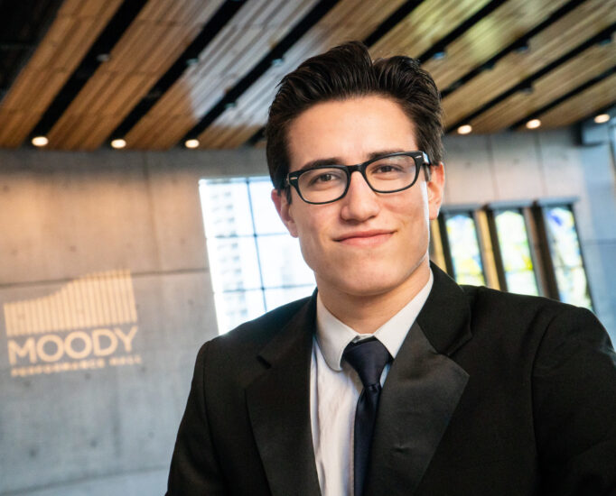 Young male musician wearing formal attire