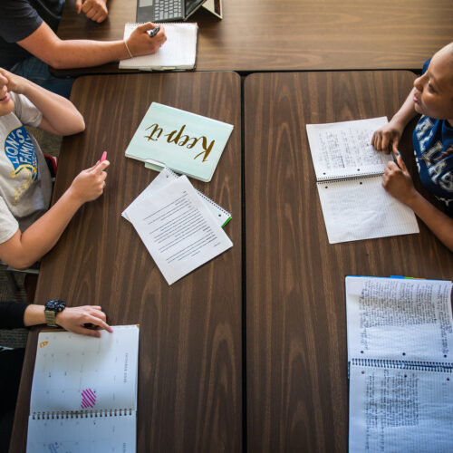 Students studying and having a conversation.