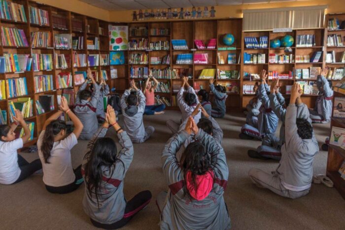 Students having a meditation session.