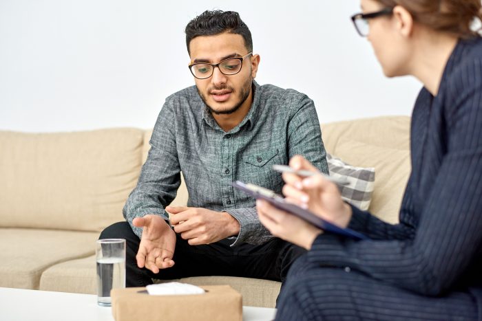 Consulting Patient at Modern Office