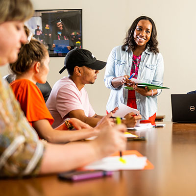 A Counseling students lecturing students.