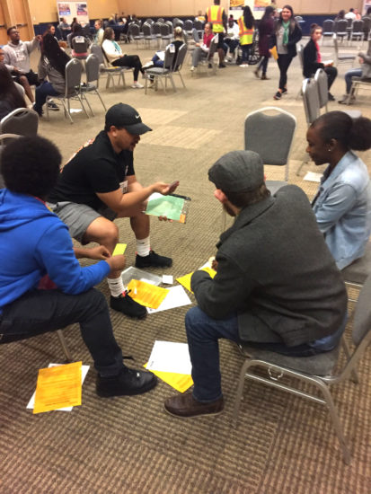 Students at Texas A&M University-Commerce participate in a poverty simulation.