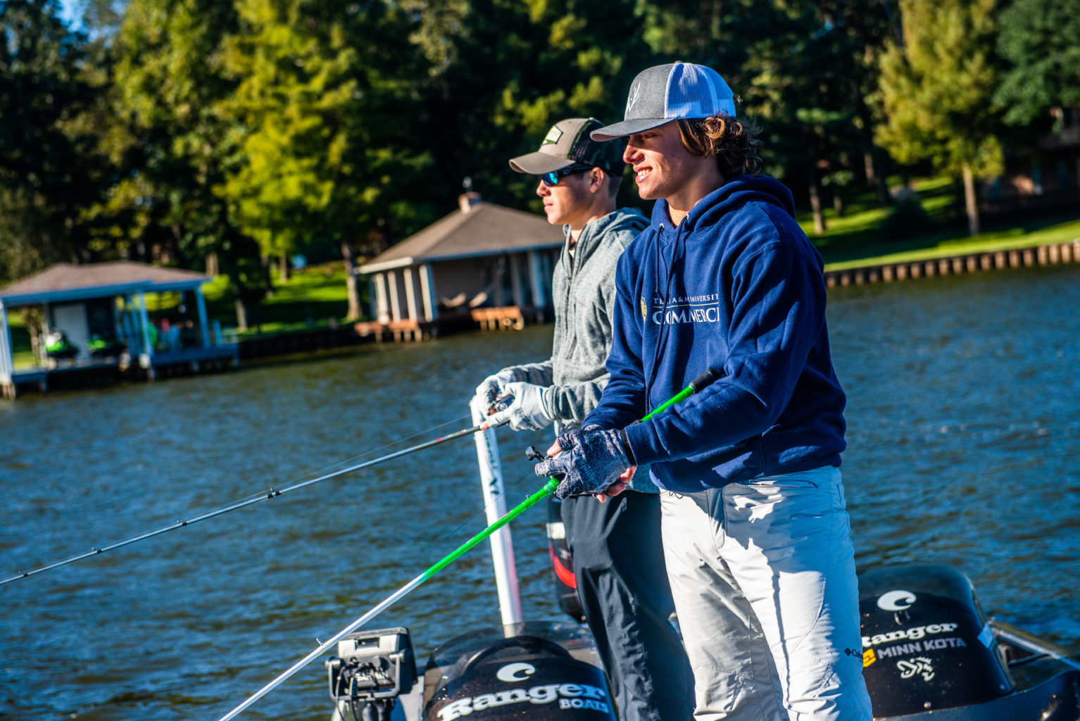 Two fishing club members fishing.