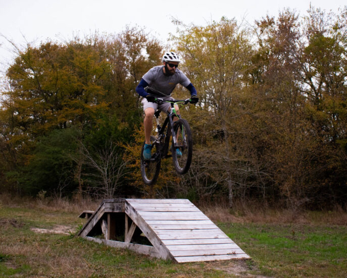 Biker riding on the biking trail at the Outdoor Adventure.