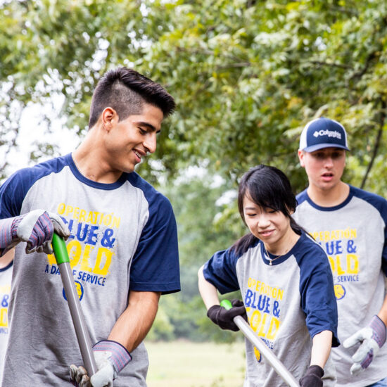 Students gardening during a community service event.