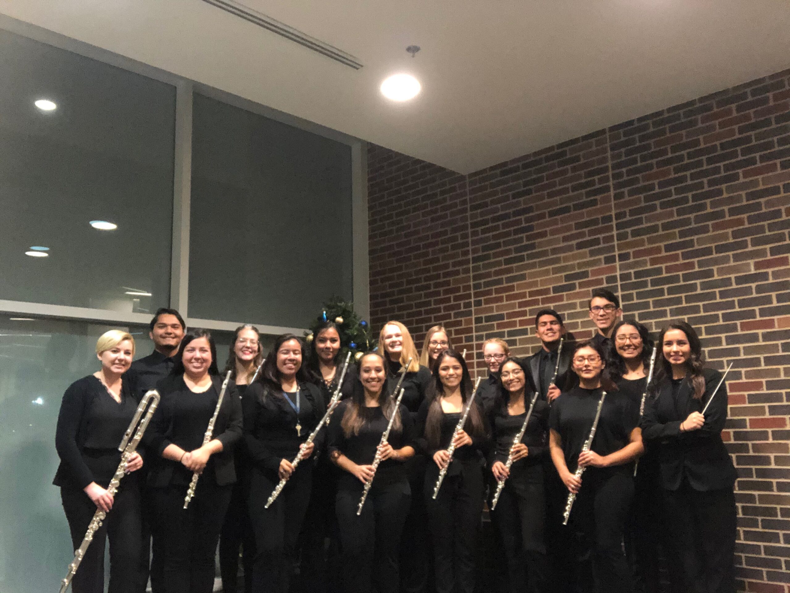 A group of students holding their flute.