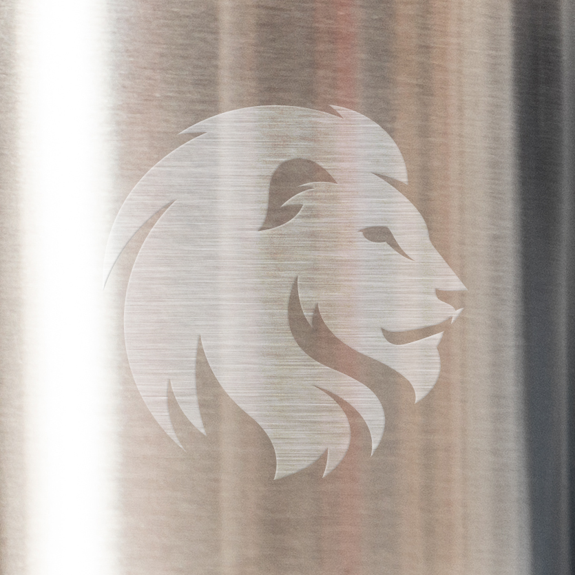 Virtual example of lion head logo on metal surface.