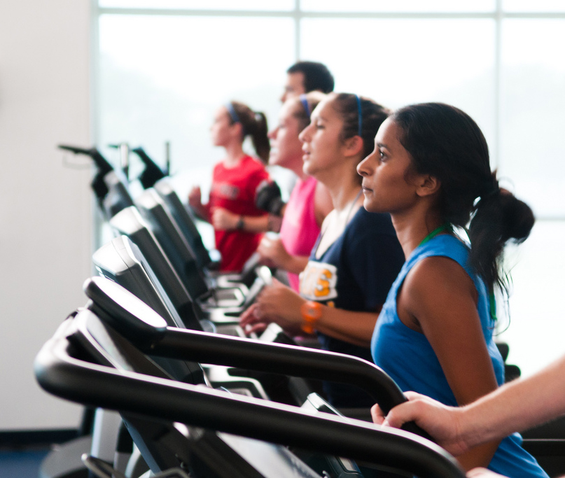 People exercising on treadmills at the Morris Recreation Center.