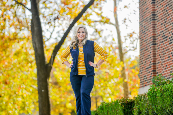 Becky Adams posing on campus.