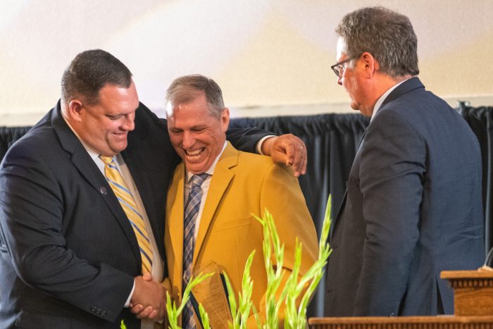 A man hand shaking with another man.