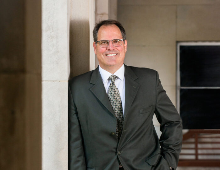 Mark Rudin smiling at the camera.