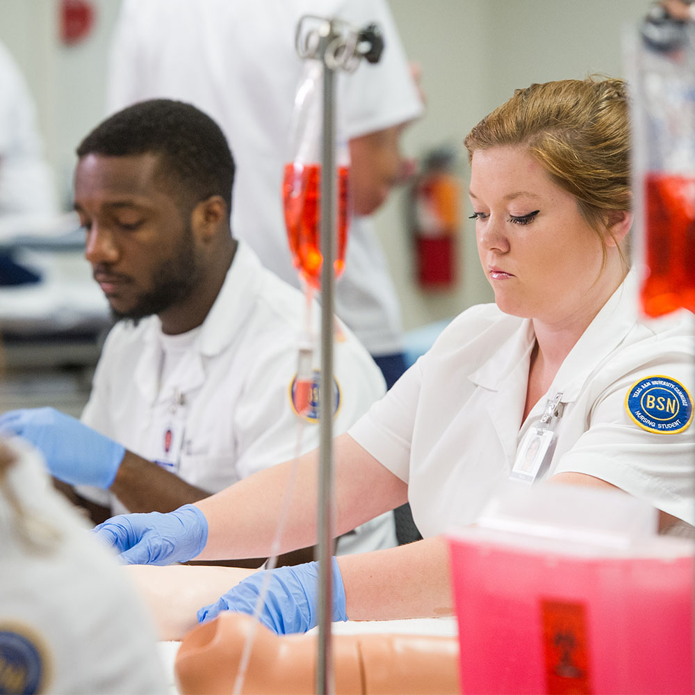 Two nursing students in the lab.