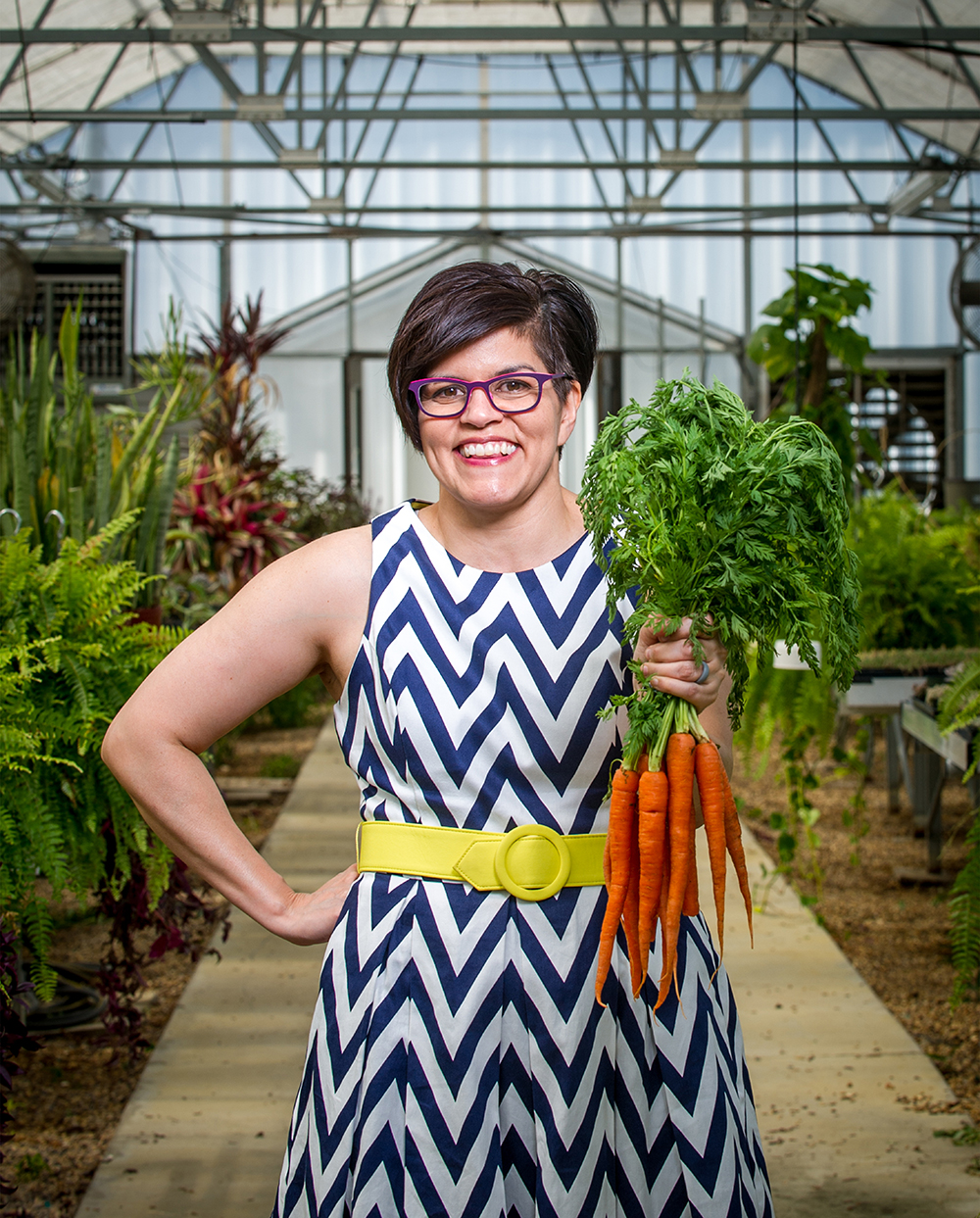 Portrait of professor in a greenhouse.