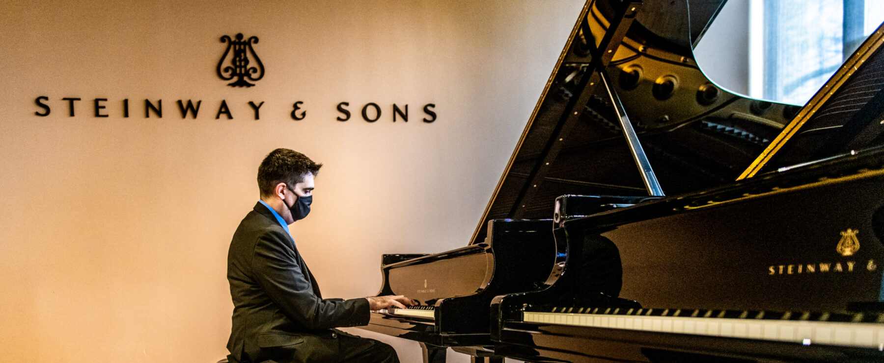 Luis Sanchez playing piano