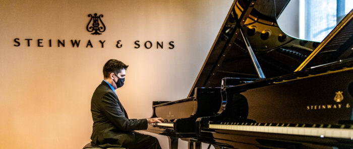 Luis Sanchez playing piano