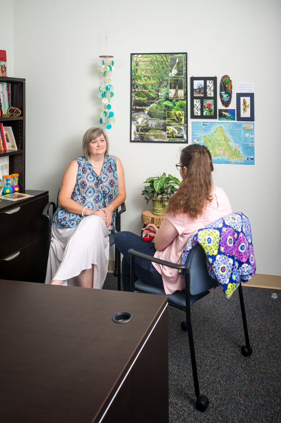 Counselor talking to patient.