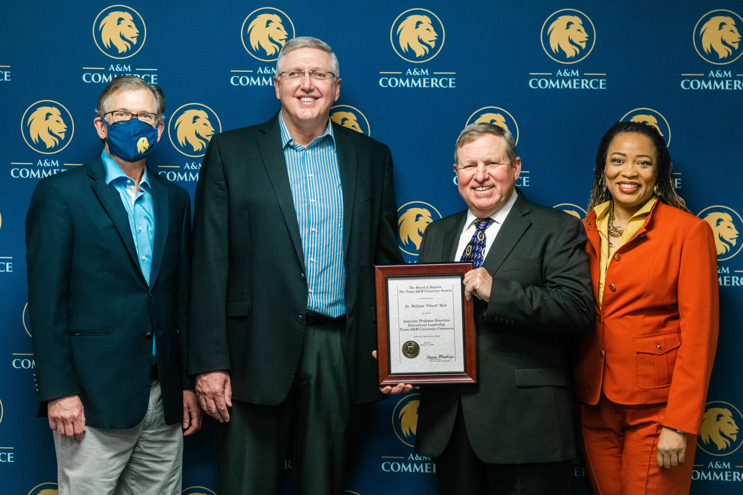 Dr. Chuck Holt receiving Emeritus certificate