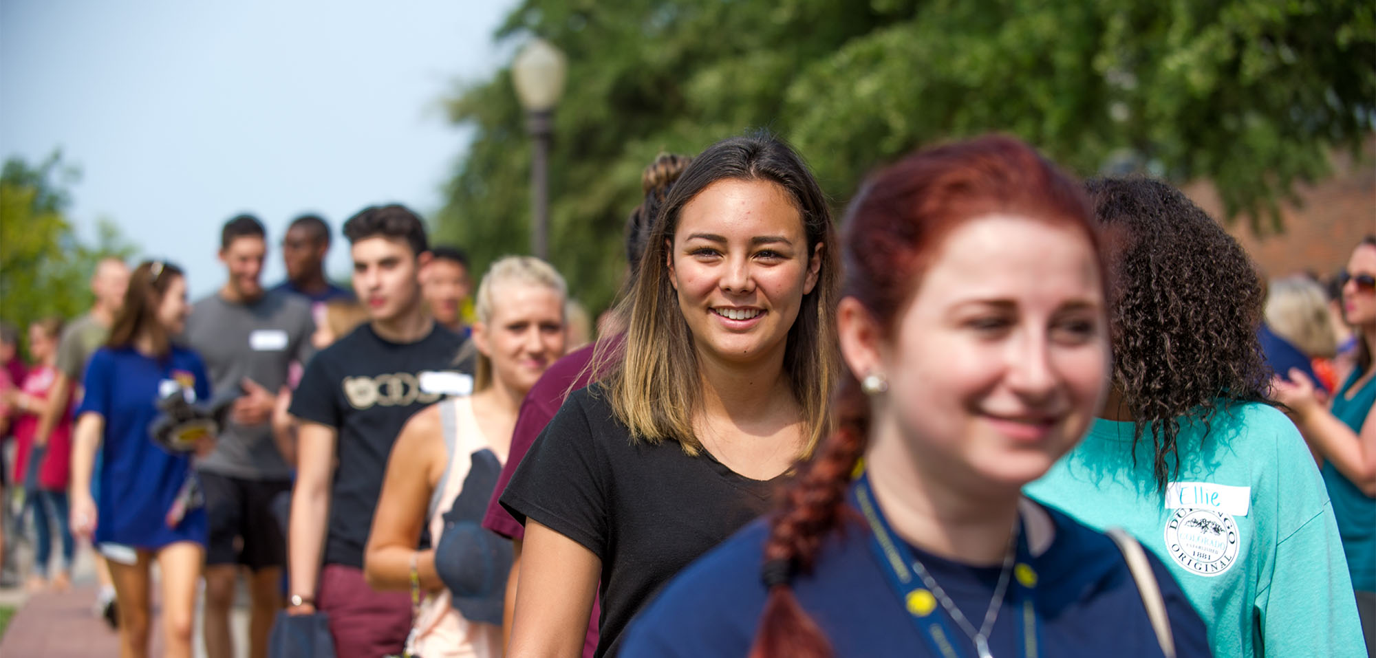 A group of students walking down.