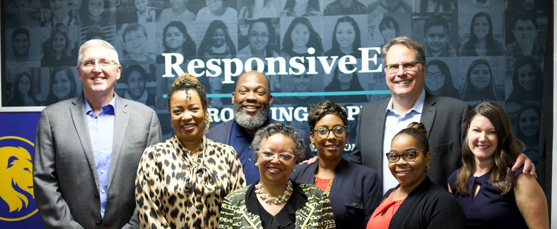 A group of faculty posing for a picture.